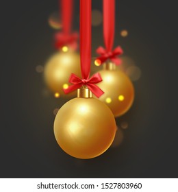 Christmas golden balls hang on red ribbon with bow. Xmas bauble with realistic light blur bokeh effect.