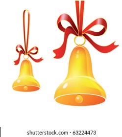 Christmas golden bell with red bow. Glossy texture of metal and silk ribbon.