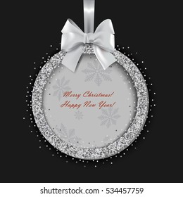 Christmas greeting card with abstract silver sparkling Christmas ball.