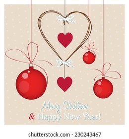 christmas greeting card, christmas balls and wooden christmas decoration hanging on polka dot background