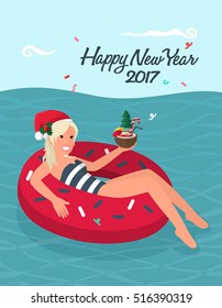 Christmas greeting card. Blonde girl floating on inflatable ring in sea. The girl Christmas hat in his hand a festive cocktail with an umbrella and candy. Caption: Happy New Year!