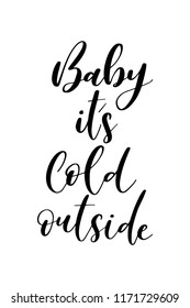 Christmas greeting card with brush calligraphy. Vector black with white background. Baby it’s cold outside.