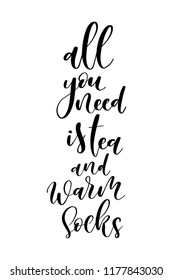 Christmas greeting card with brush calligraphy. Vector black with white background. All you need is tea and warm socks.
