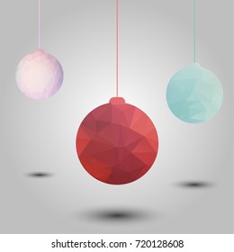 Christmas greeting card concept with polygonal red Christmas balls hanging on winter background