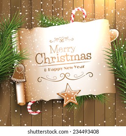 Christmas greeting card with empty paper with calligraphic inscription on wooden background 