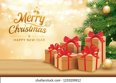 Christmas greeting card with gifts boxes on wooden table and tree bokeh background. Xmas and happy new year.