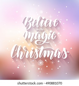 Christmas greeting card with hand drawn inscription on blurred background with lights. Believe in the magic of Christmas. Vector calligraphic design, print, poster