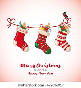 Christmas greeting card with hanging socks in flat style. Vector illustration.