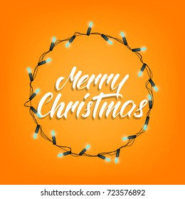 Christmas. Greeting card with Merry Christmas calligraphy and shiny Christmas lights garland. Festive background for winter holidays