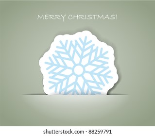 Christmas greeting card with paper flake in a pocket