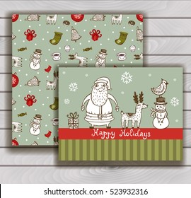 Christmas greeting card with Santa and Reindeer and snowman, with an envelope.