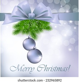 Christmas greeting card with silver bow and balls