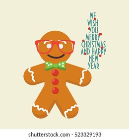 Christmas Greeting card. Smiling Gingerbread with glasses and bow tie on. Typographic Text "We wish you Merry Christmas and Happy New Year".