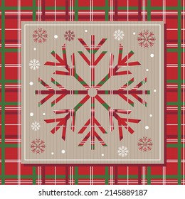 christmas greeting card with snowflakes and tartan background