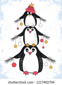 Christmas greeting card three funny penguins with fir branches and Christmas balls