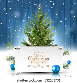 Christmas Greeting Card With Christmas Tree On Wooden Background