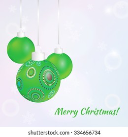 Christmas greeting card. Vector illustration with green balls on light background with snowflakes.