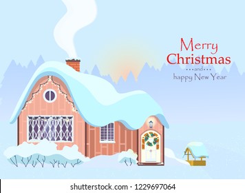 Christmas greeting card. Winter morning landscape with cozy countrysouse decorated with Christmas wreath and garlands. Wooden well and snowy bushes near house.