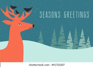 christmas greeting card winter scene with deer and birds perched on his antlers 