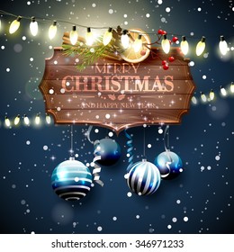 Christmas greeting card with wooden sign, lights and baubles at night