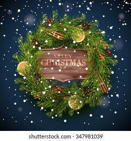 Christmas greeting card - wreath with traditional decoration and wooden sign on blue background