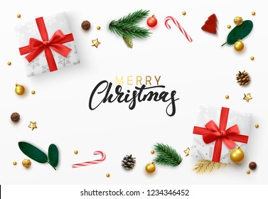 Christmas greeting card. Xmas elements design, white gift box, gold ball, pine branches, candies. Decorative realistic objects. Merry Christmas Calligraphic text. view from above vector illustration