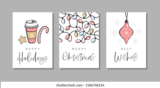 Christmas greeting cards with handwritten calligraphy and hand drawn decorative elements.