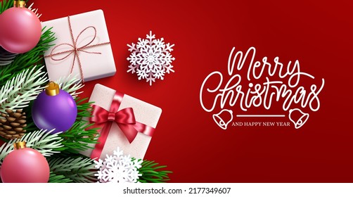 Christmas greeting vector background design. Merry christmas typography text in red space with xmas gifts, balls and pine leaves elements for holiday season messages. Vector illustration.
