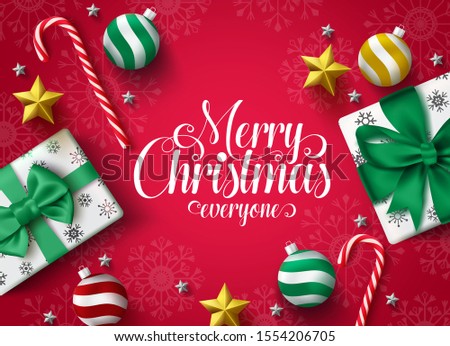 Christmas greeting vector banner design. Merry christmas typography greeting text for holiday season with decoration of xmas gift, ball, star and candy cane in red background with snowflakes pattern. 