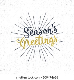 Christmas greetings lettering, holiday wish, saying and vintage label. Season's greetings calligraphy. Seasonal greeting typography design. Vector Illustration. Letters composition with sun bursts
