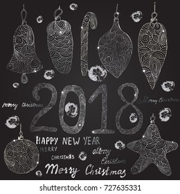 Christmas hand drawn balls, toys in silver. Inscriptions: Happy New Year and Merry Christmas
