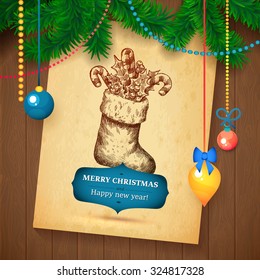 Christmas Hand Drawn Sock Vector sketch paper card for xmas design with balls. Toys and wood background and fur-tree branch design. Hand drawn unique illustration.