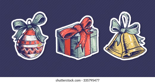 Christmas hand drawn vector stickers. Cute colorful present, toy ball and bell with ribbon. New year elements.