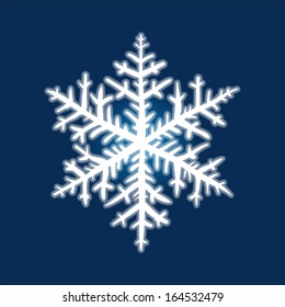 Christmas hand-drawn snowflake on deep blue background.