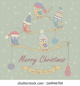 Christmas and Happy New Year greeting card with cute owls in winter caps sitting on branches. Cartoon style.