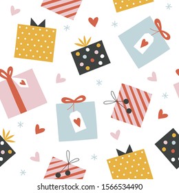 Christmas and Happy New Year seamless pattern with gift boxes. Funny colorful festive background with presents, hearts and snowflakes.