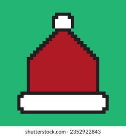 Christmas hat in pixel art design isolated on green background. Christmas and new year pixel art design. Vector illustration