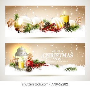 Christmas headers with glass baubles, traditional decorations and gingerbreads in the snow