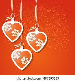 Christmas heart toys with snowflakes on orange