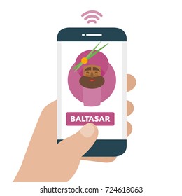 Christmas is here. Send your letter to The three wise men of orient from your cell phone. Hand holding smartphone. Balthazar written in spanish