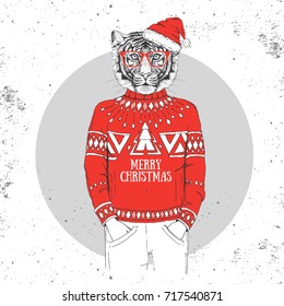 Christmas Hipster fashion animal tiger dressed a New Year hat and pullover