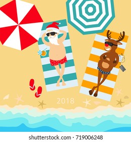 Christmas holiday 2018. Santa Claus and deer Rudolph relax on the beach. Greeting Christmas card