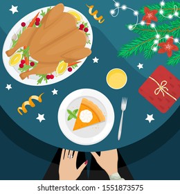 Christmas holiday dinner. Flat lay with turkey with cranberries, pumpkin pie, champagne, fir branches and gifts.