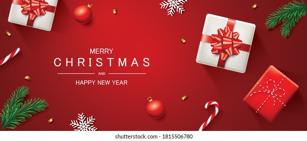 Christmas Holiday and Happy New Year holiday background.Top view of Christmas gifts with confetti,pine leaf,candy cane and ornaments on red background, Vector design for website,headers,greeting cards