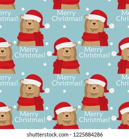 Christmas holiday seamless pattern of cute brown bear wear Santa hat and red scarf with tiny star and Merry Christmas text on blue background. Design for winter holidays greeting season wrapping paper