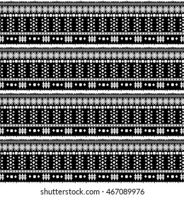 Christmas holiday seamless pattern. Ethnic boho background. Tribal art vintage blue print. Wallpaper, wrapping. Fabric design. Border, geometric shapes. Black and white