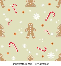 Christmas holiday seamless pattern. Gingerbread men cookies and mint caned candies with snowflakes.