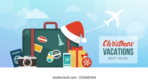 Christmas holiday vacations around the world: suitcase with travel and festivity items, plane flying in the background