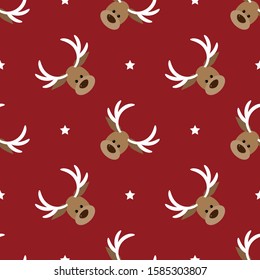 Christmas holidays cartoon seamless pattern of cute reindeer head with star on red background. Vector illustration.