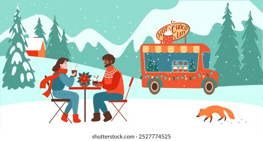Christmas holidays in mountains. People are sitting at the table. Outdoor cafe